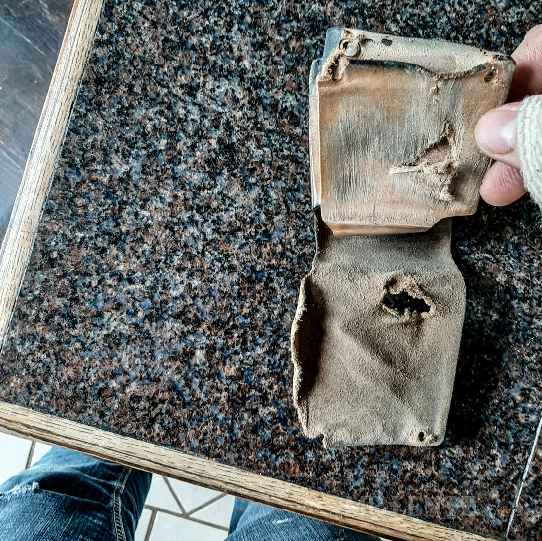 wallet saves ass of motorcycle rider