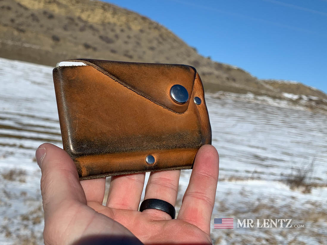 customer photo of an ageing snap wallet