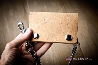 holding a cork biker wallet