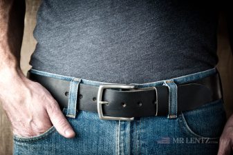 wearing single layer black leather gun belt