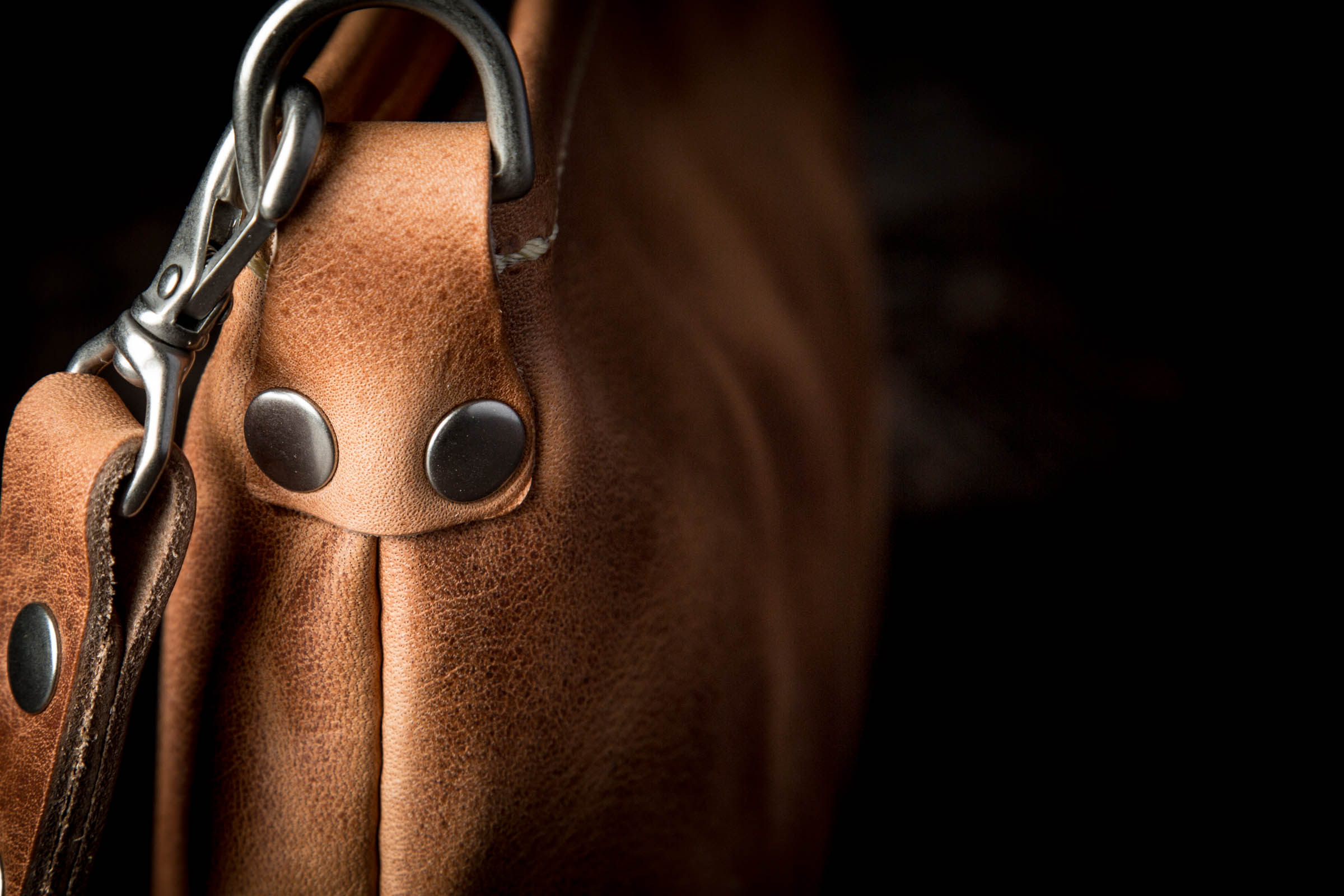patina on a fine leather clutch