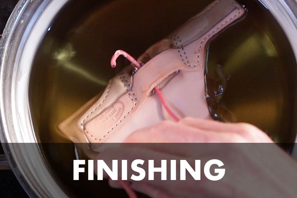 finishing holster button