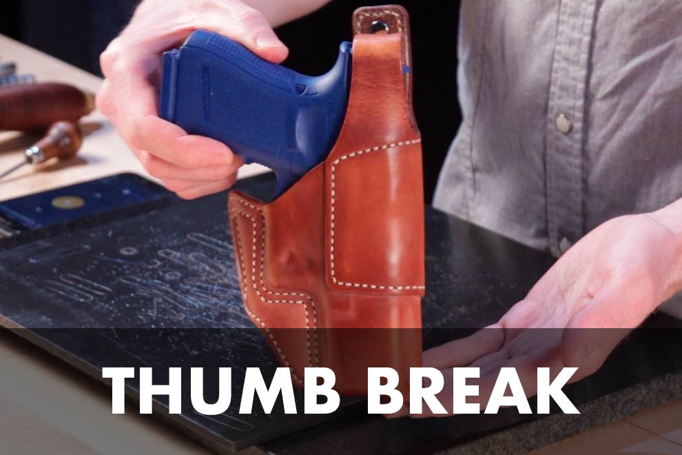 thumb break holster button