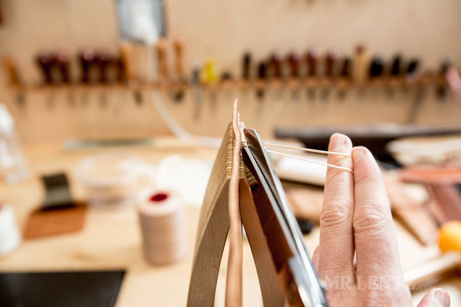 cutting the thread at the end of a saddle stitch