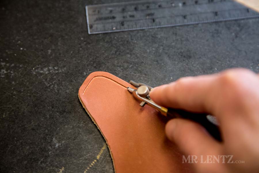 cutting the stitch groove on an ax sheath