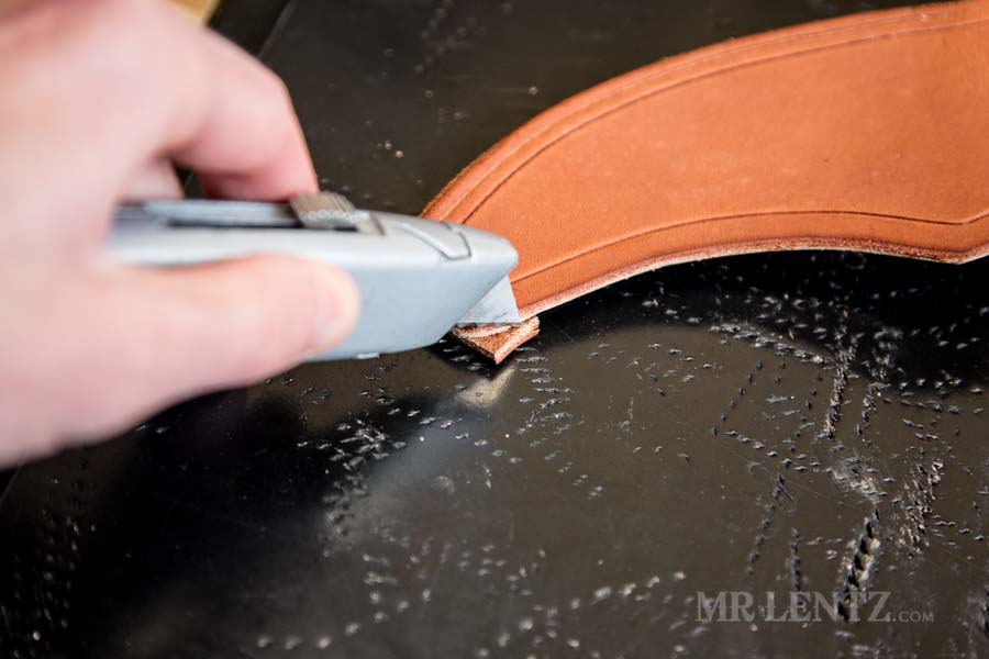 trimming the welt on leather axe sheath