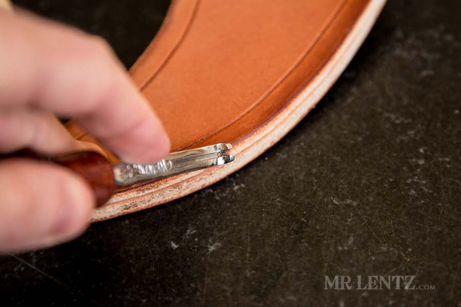 beveling the edge of an axe sheath