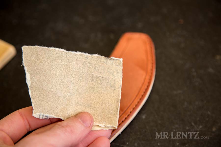 medium sandpaper used on sheath edge