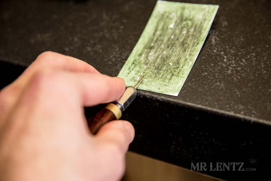 stropping the diamond awl for stitching axe sheath