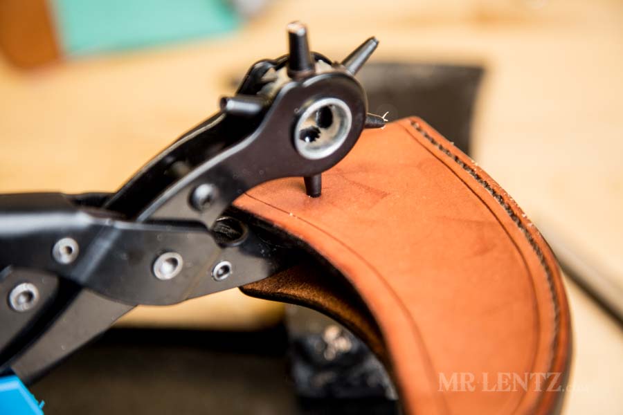 punching holes for axe sheath button