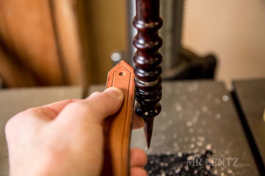 edge slicking retaining strap