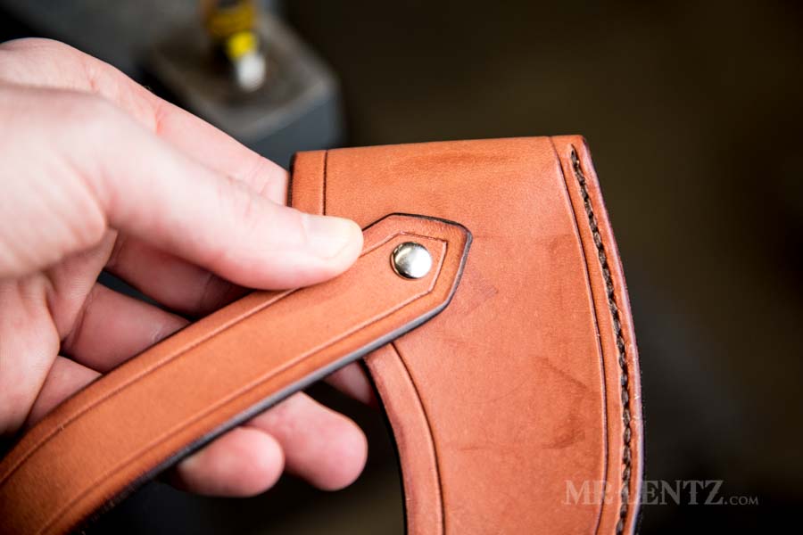 setting rivets in retaining strap