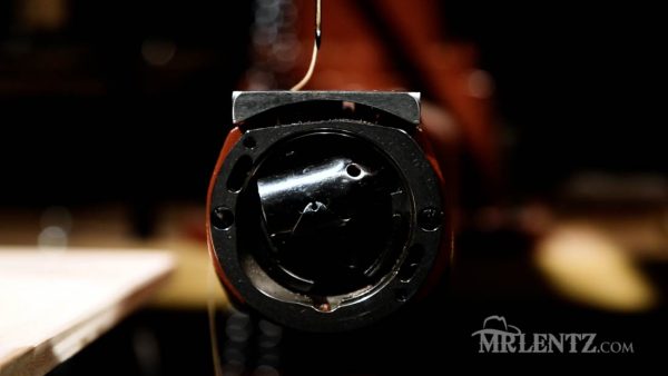 inside the bobbin area of a leather sewing machine