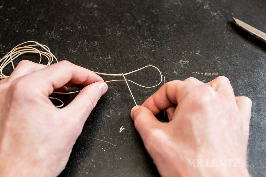 locking the thread onto the needle for leather sewing