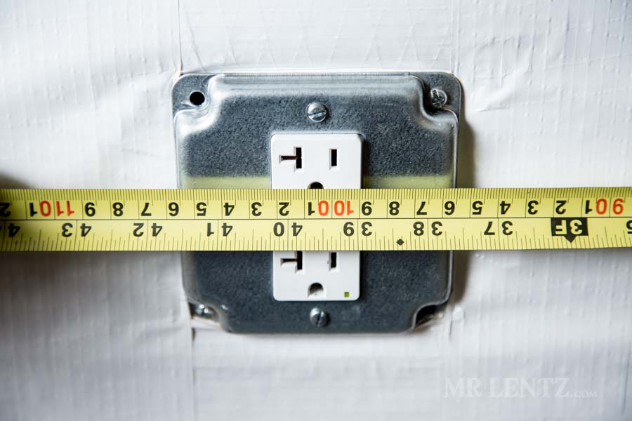 measuring for outlet holes when installing plywood walls