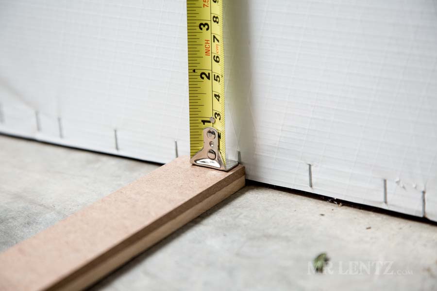 measuring using shims for wall installation