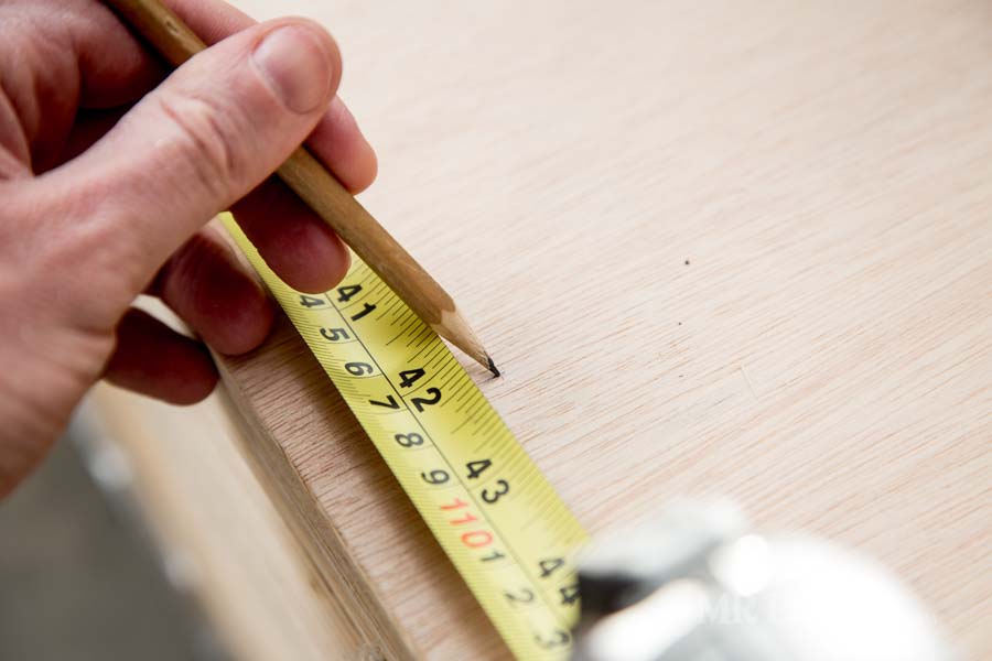 measuring the width of a plywood wall