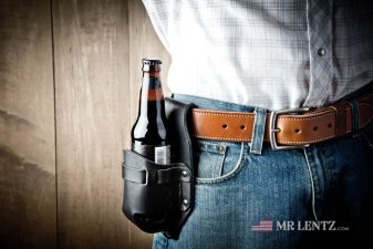 wearing a black leather beer holster