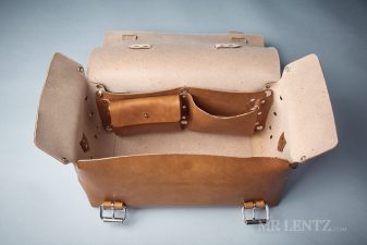 open leather duffel bag