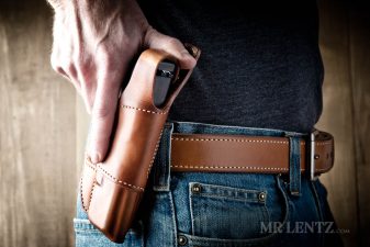 thumb break leather holster in saddle brown color