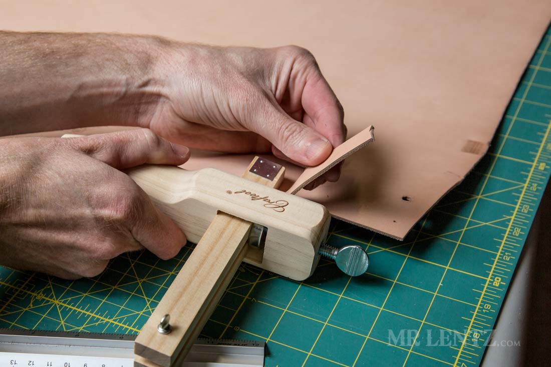 cutting the strap used on knife sheath