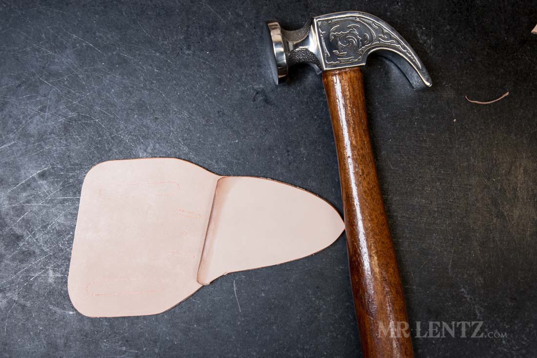 smooth faced hammer used to press glued pieces of knife sheath