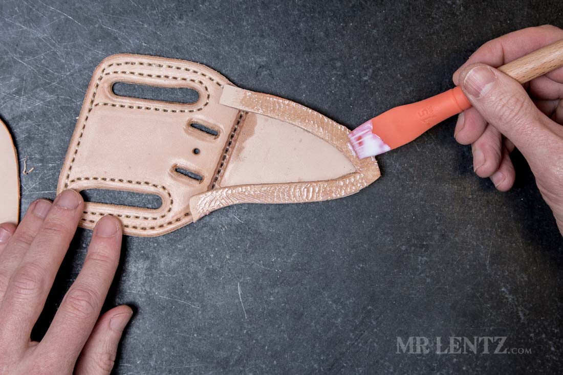 applying glue to a knife sheath welt