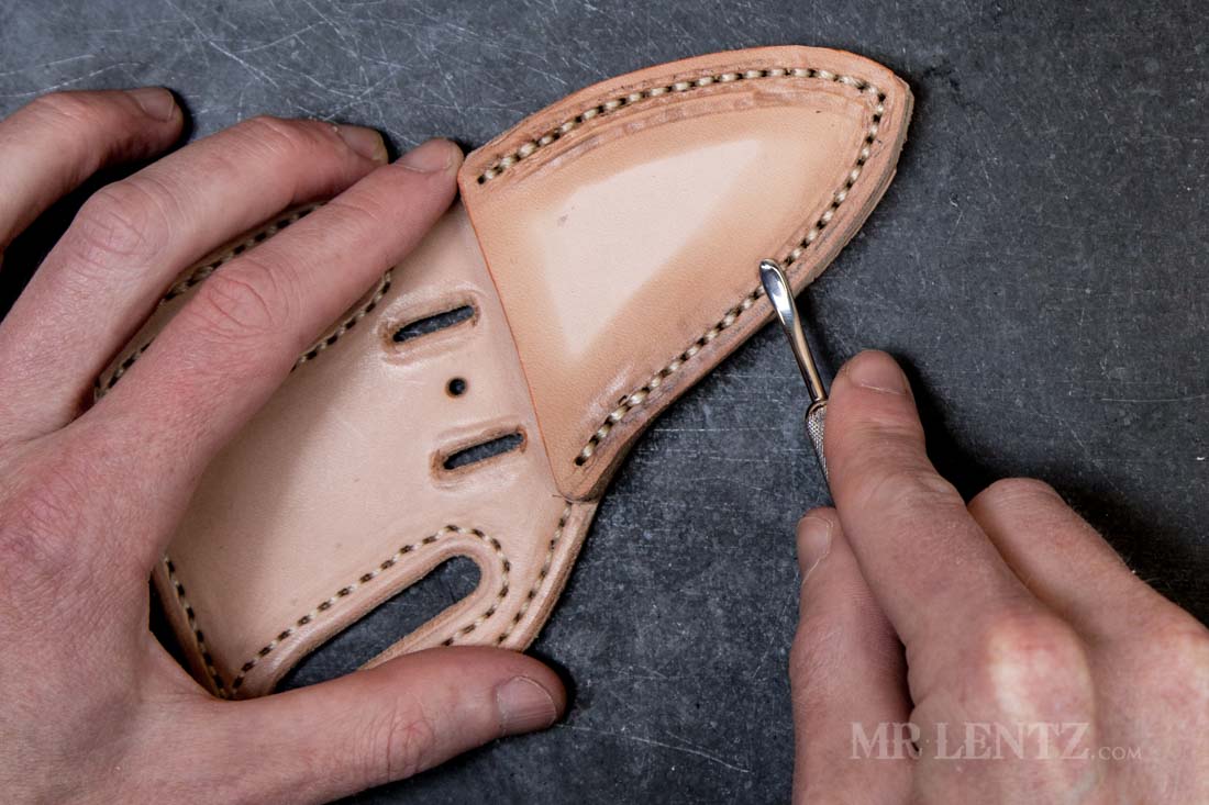 using a modeling spoon to remove sewing machine marks on leather