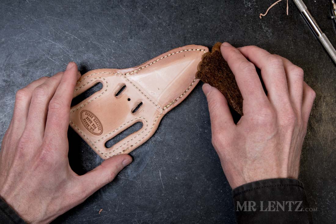 wetting the edges of the sheath