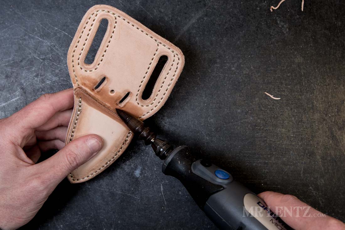 using a dremel burnisher to burnish the edge of a leather knife sheath
