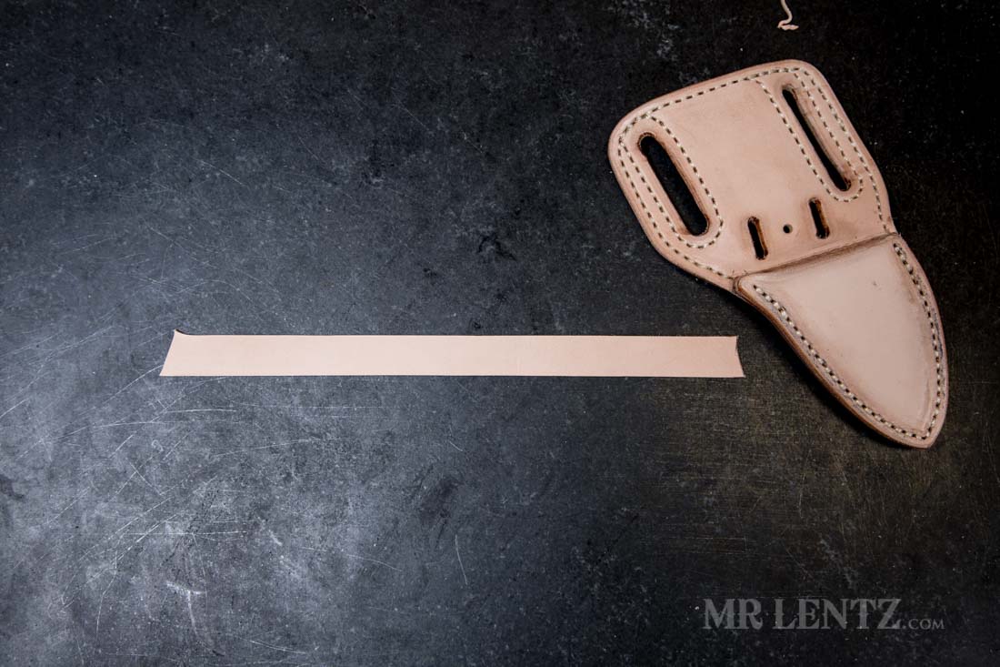 strap used for retaining knife in sheath