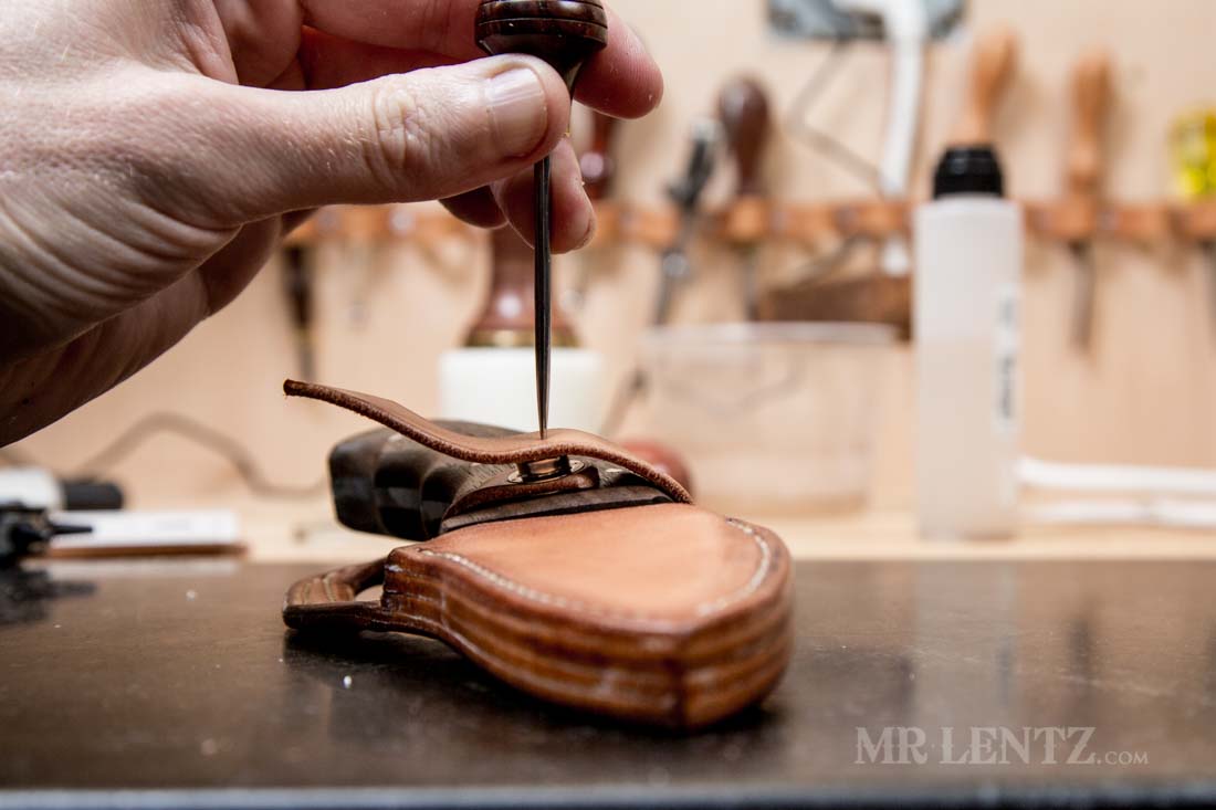 marking location of female snap on retaining strap for knife sheath