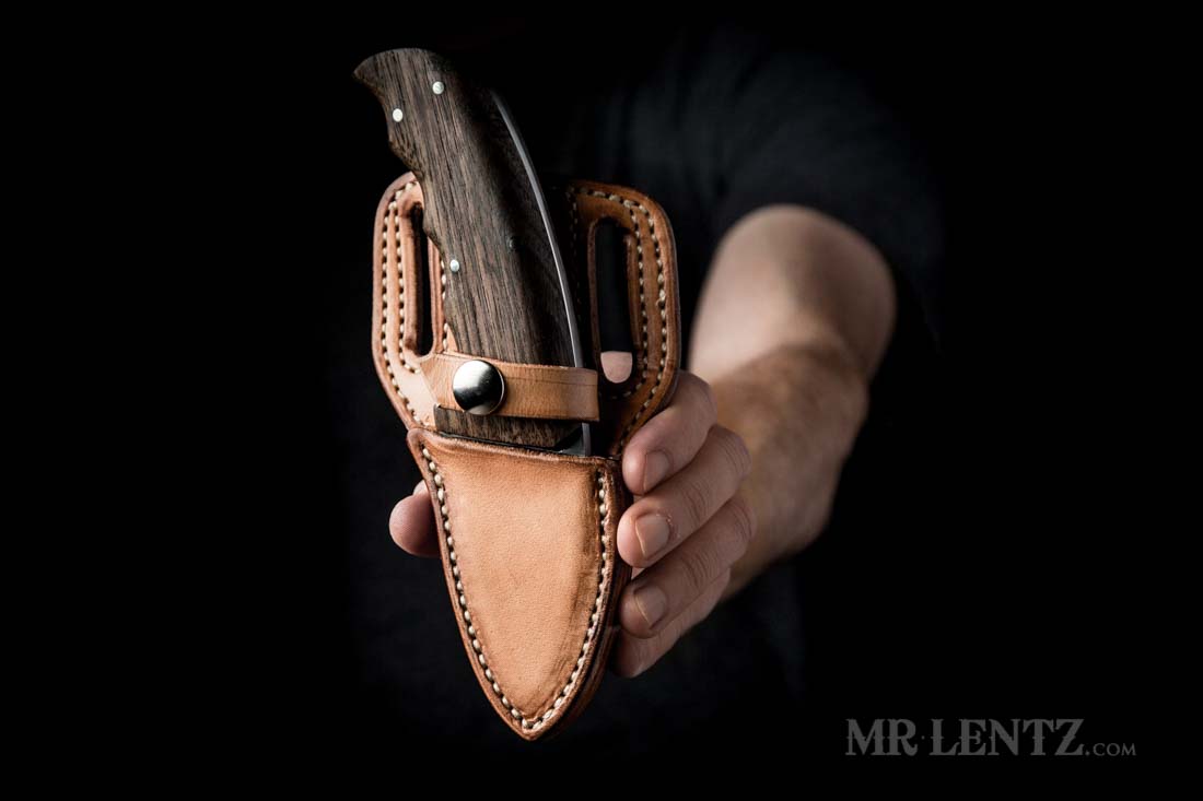 handcrafted leather knife sheath with retaining strap