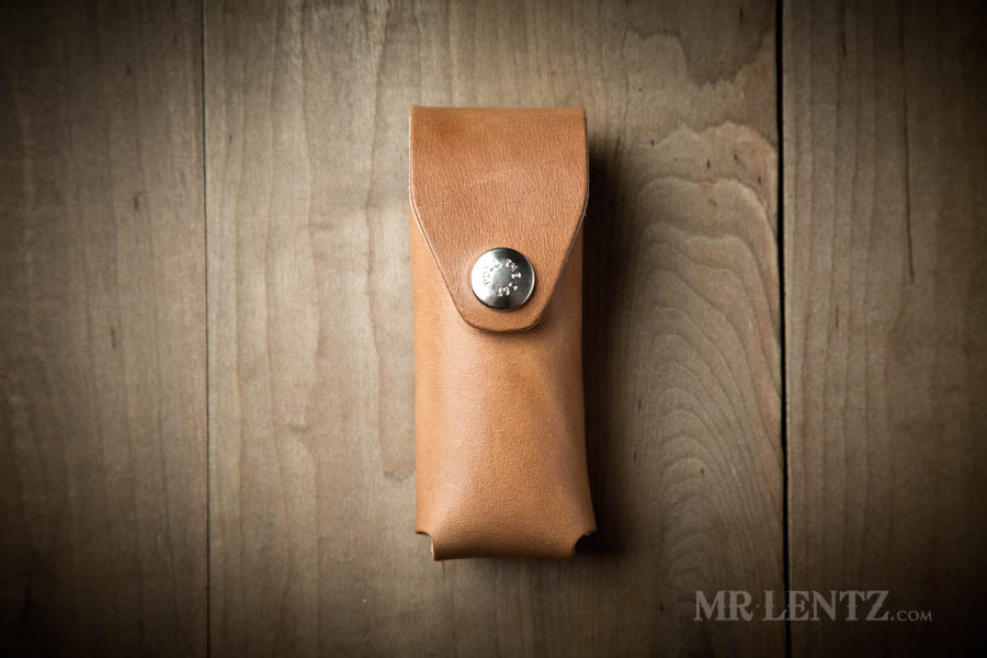 brown leatherman multi tool sheath with locking snap
