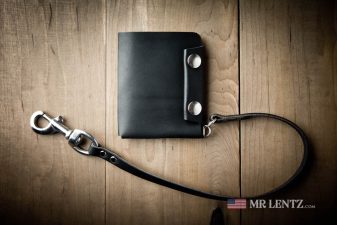 leather chain on black leather wallet with snap closure