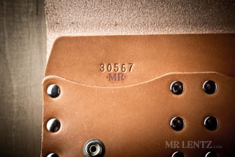 stamped numbers on leather trucker wallet