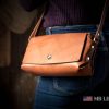 brown leather purse in crossbody style