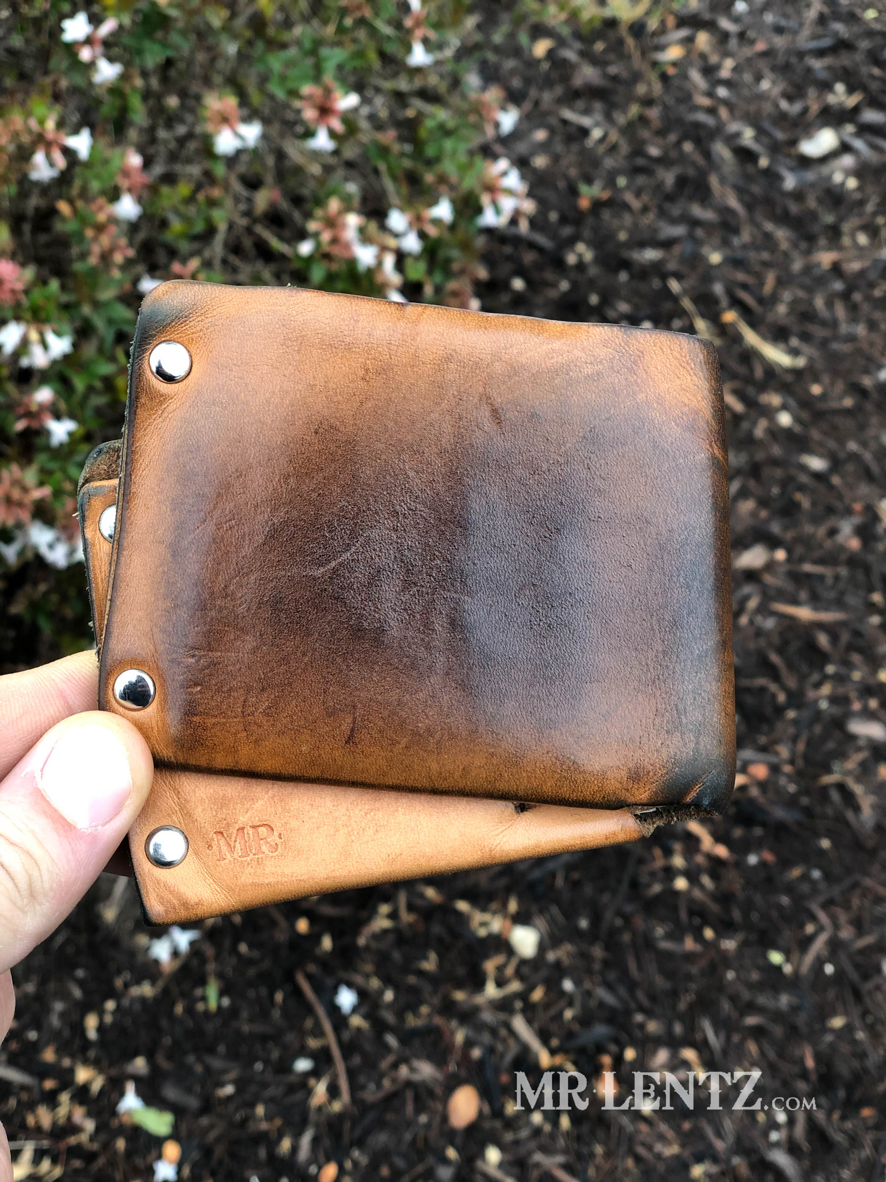 patina on mens leather wallet