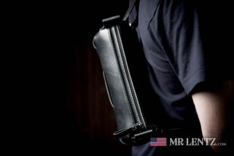 wearing the black fanny pack day bag for men or women