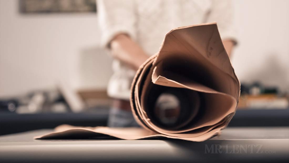 unrolling leather hide