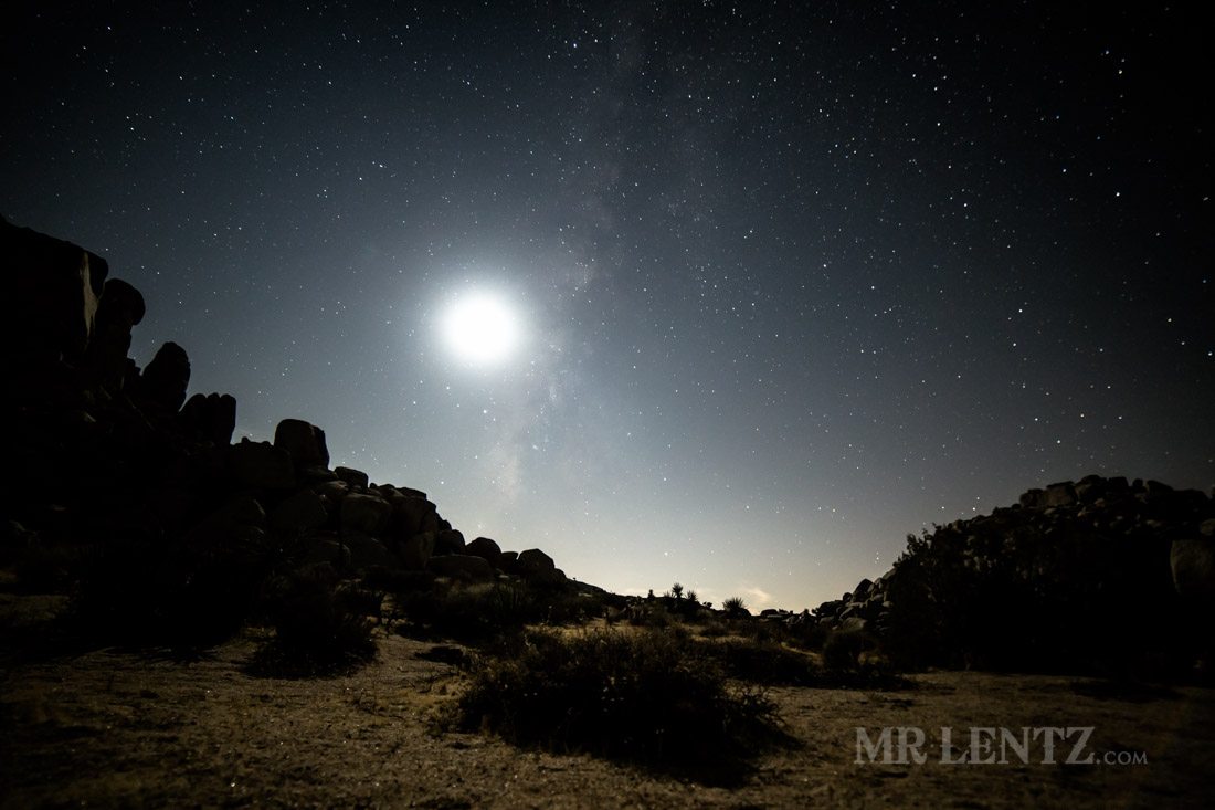 moon setting in the desert night sky